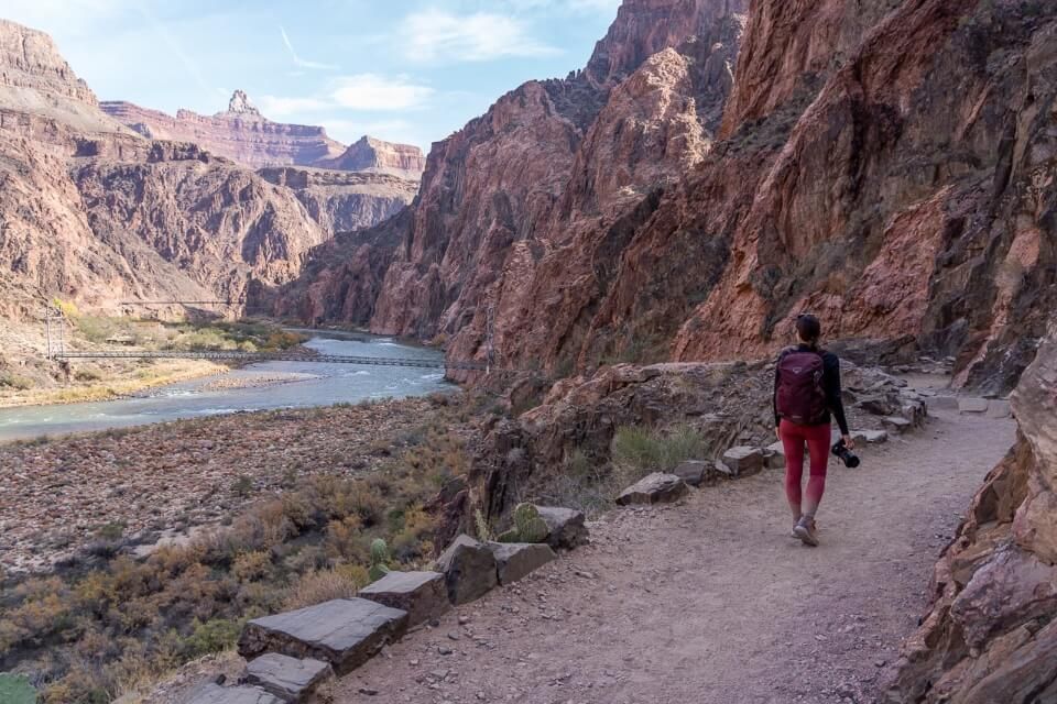 Walking along a path in northern arizona with colorado river
