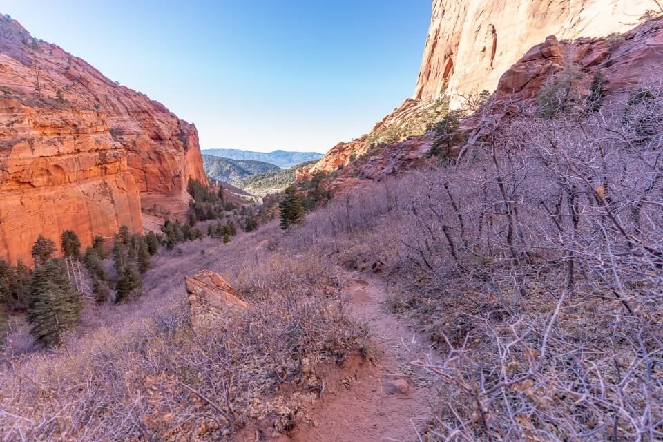 South Fork of Taylor Creek Trail best hike in kolob canyon zion national park unofficial hike means it is very quiet and peaceful path running through a box canyon with trees in winter