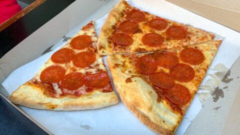 Best pizza in NYC three slices of pepperoni pizza