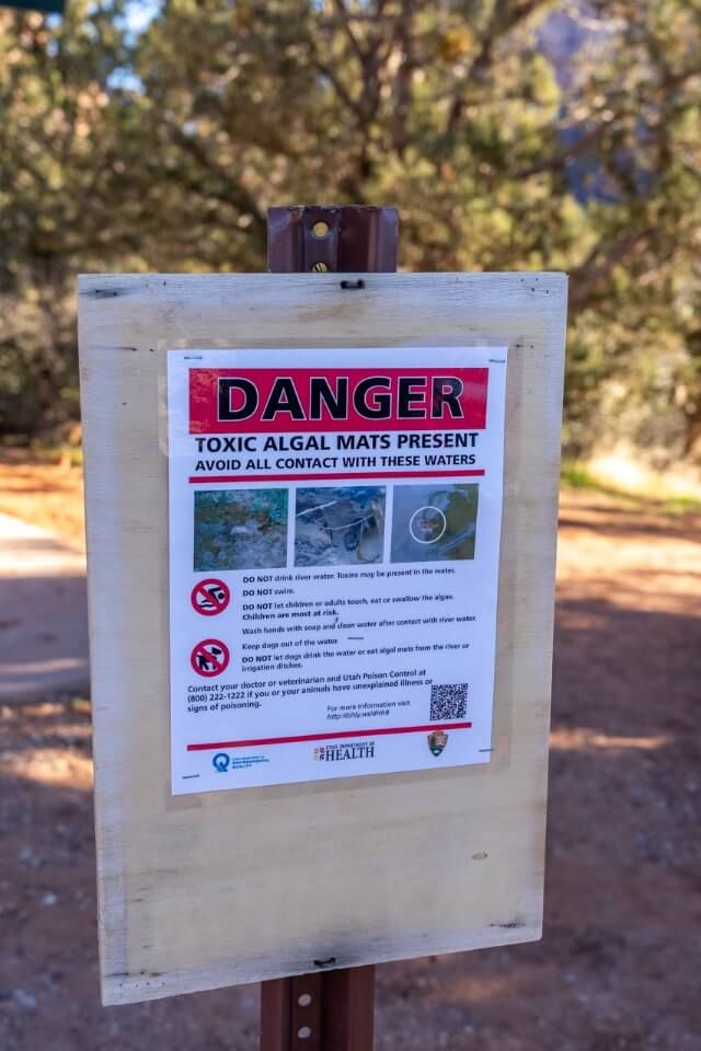 Danger of toxic cyanobacteria sign at the start of a hike in utah