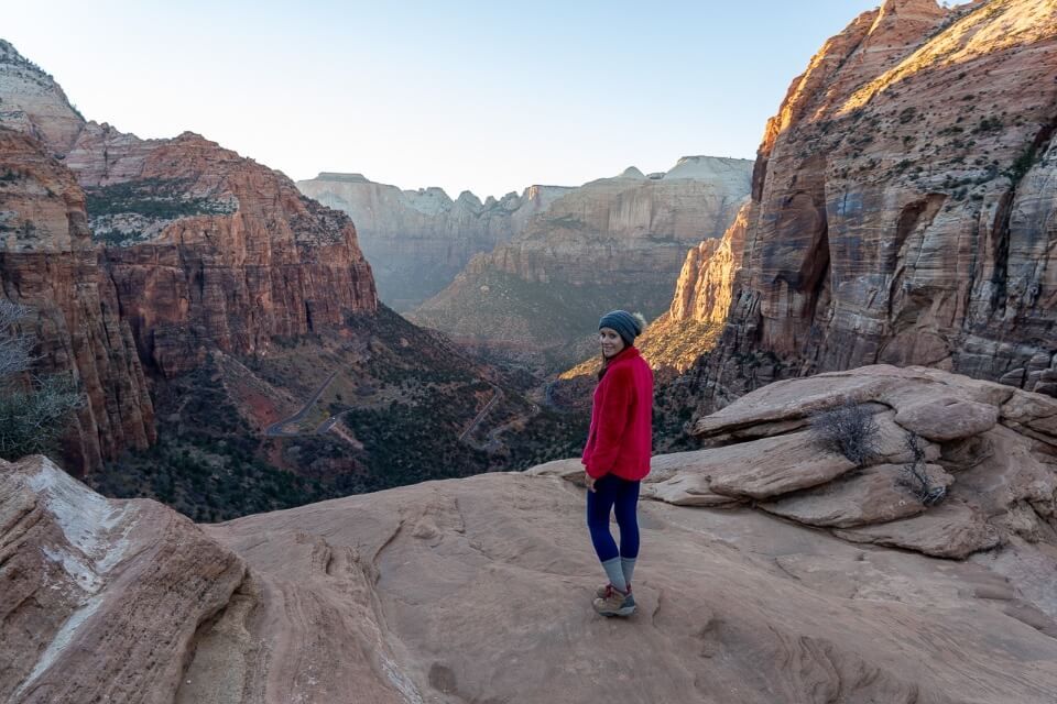 Sunset at Zion Canyon Overlook hiker posing for photo
