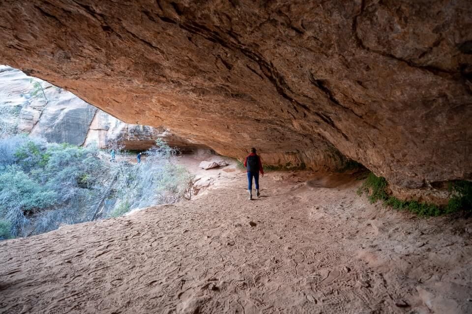 Sandy cave like formation covered by sandstone rocks on the Zion Canyon Overlook trail in zion national park utah