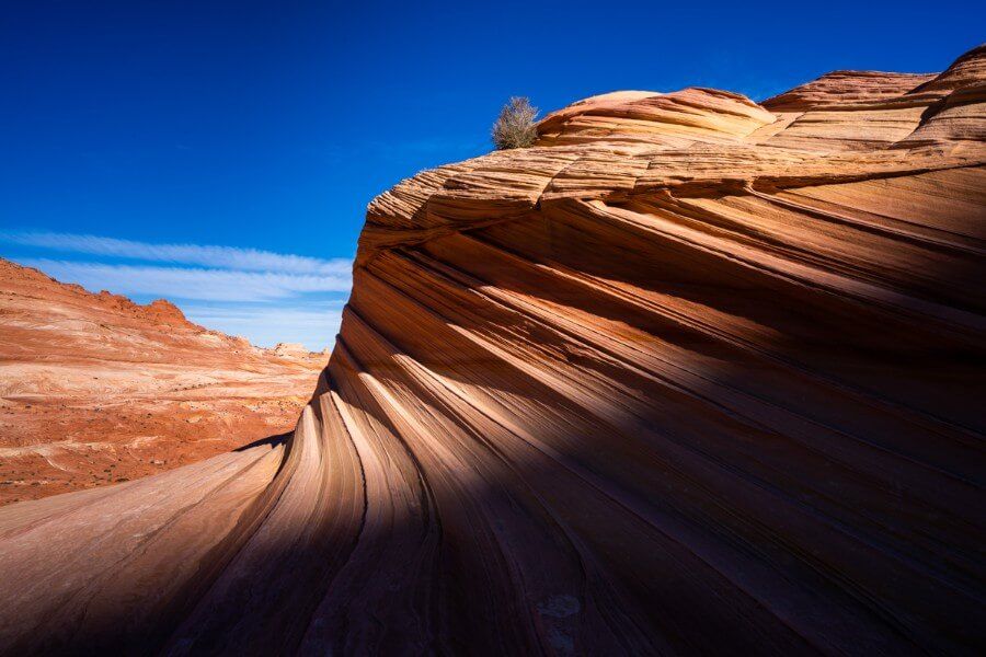 Contrast between shadows and sun on rock formations hiking The Wave in northern arizona coyote buttes north