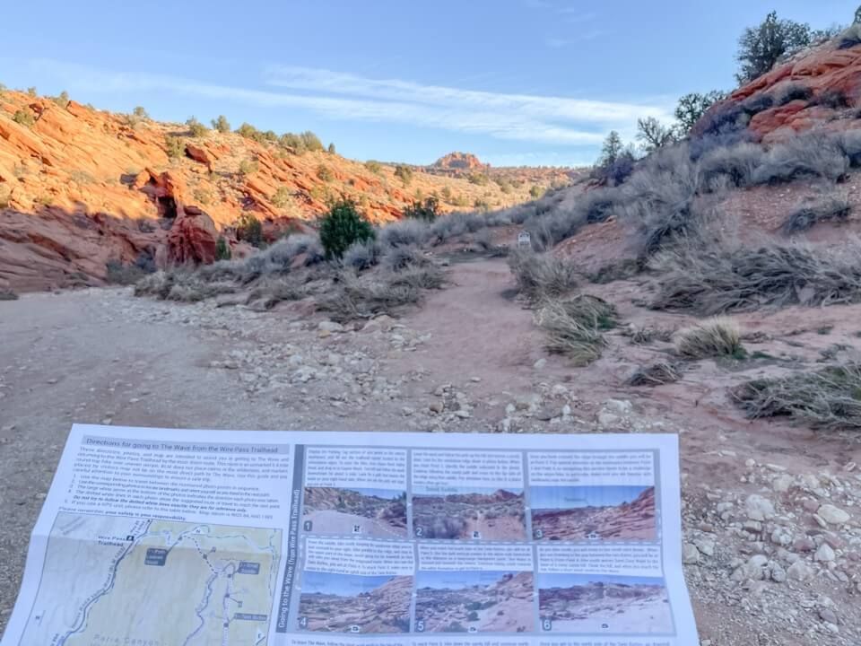 Walking in Wire Pass wash using a paper map for directions