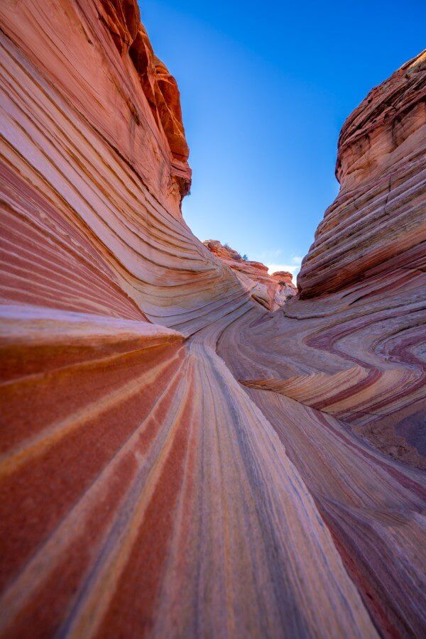The Second Wave is stunning and should be visited when hiking to The Wave in Arizona long straight smooth colorful lines on rock formaitons