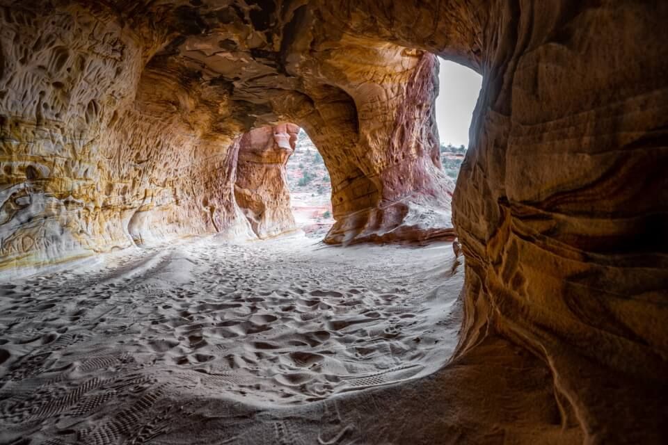 Man made sand caves called moqui caverns near kanab utah popular instagram spot when light beams inside caves onto sand