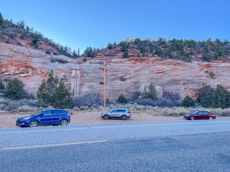 Sandy roadside parking lot for short hike to Moqui Caverns sand caves in Kanab Utah