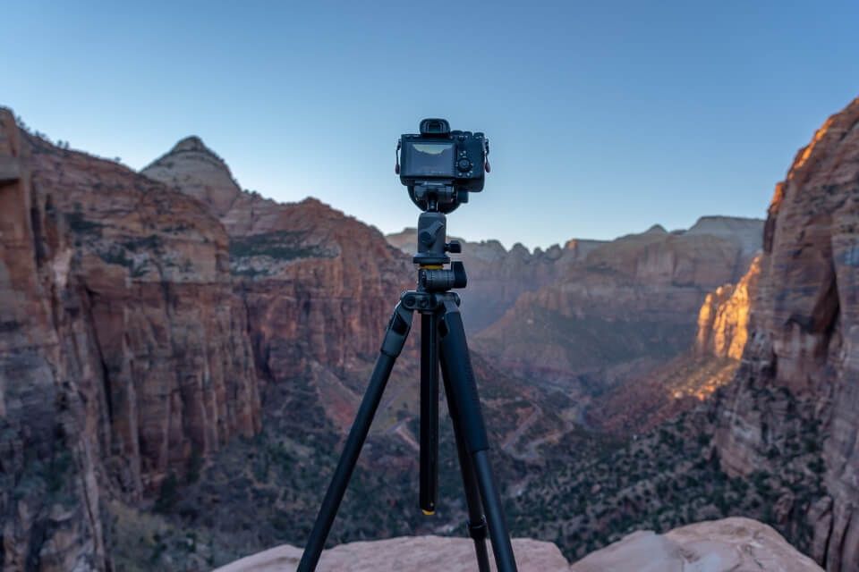 Camera on tripod where are those morgans photography shooting sunset at Zion canyon overlook on a cold day in december for winter shots