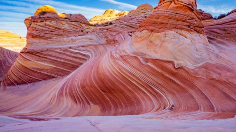 The Wave in Kanab Utah swirling lines and wavy patterns in pink and orange unique landscape best thing to do on a visit to Kanab