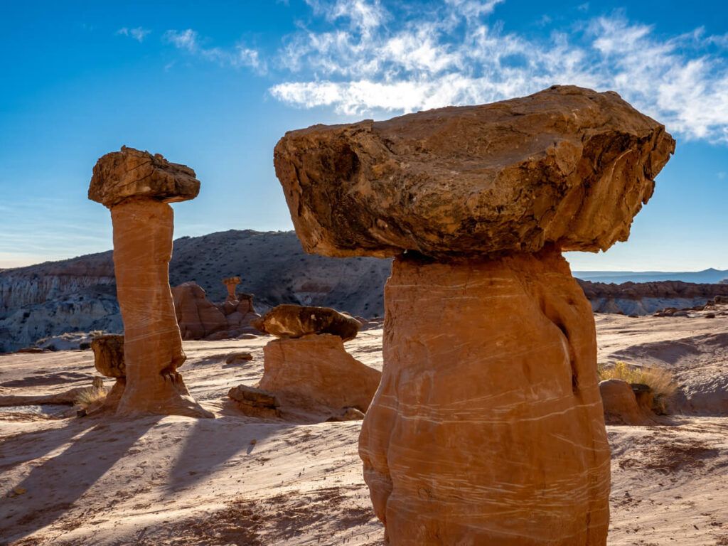 Toadstool Hoodoos mushroom rock formations on a bright blue day visiting kanab in southern utah
