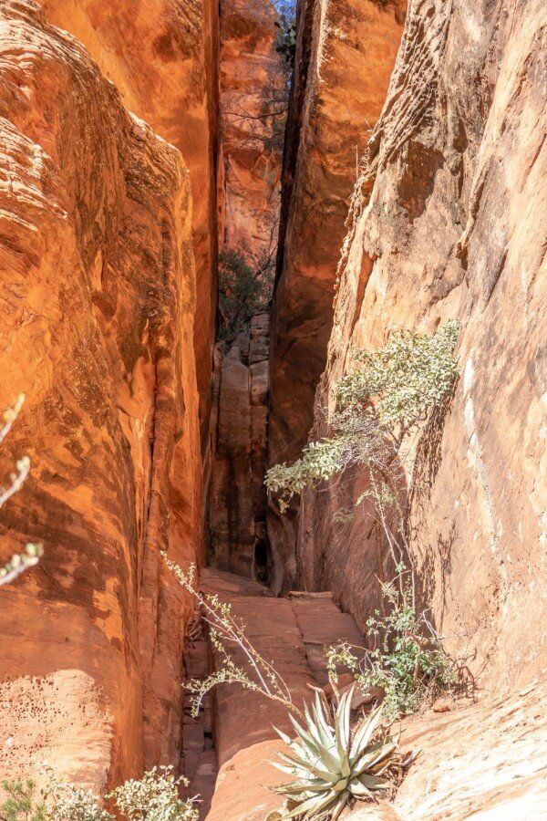 One way into the Subway Cave in Sedona is direct up steep sandstone rocks