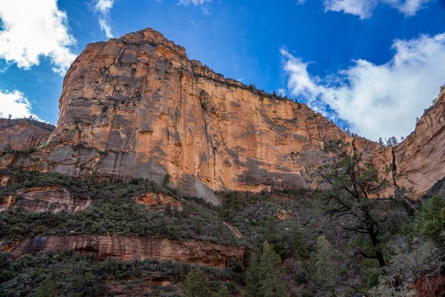 View of huge formation canyon wall with blue sky background