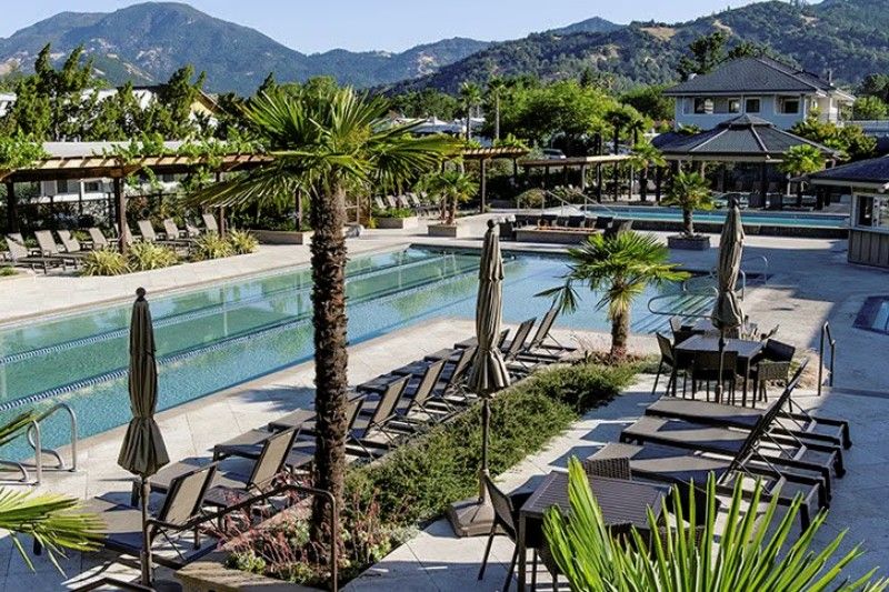 Stunning backdrop of the Calistoga Hot Spring with pools and palm trees