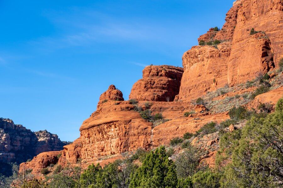 Bell Rock shaped sandstone formation on the back of Courthouse Butte formation hiking Sedona Arizona
