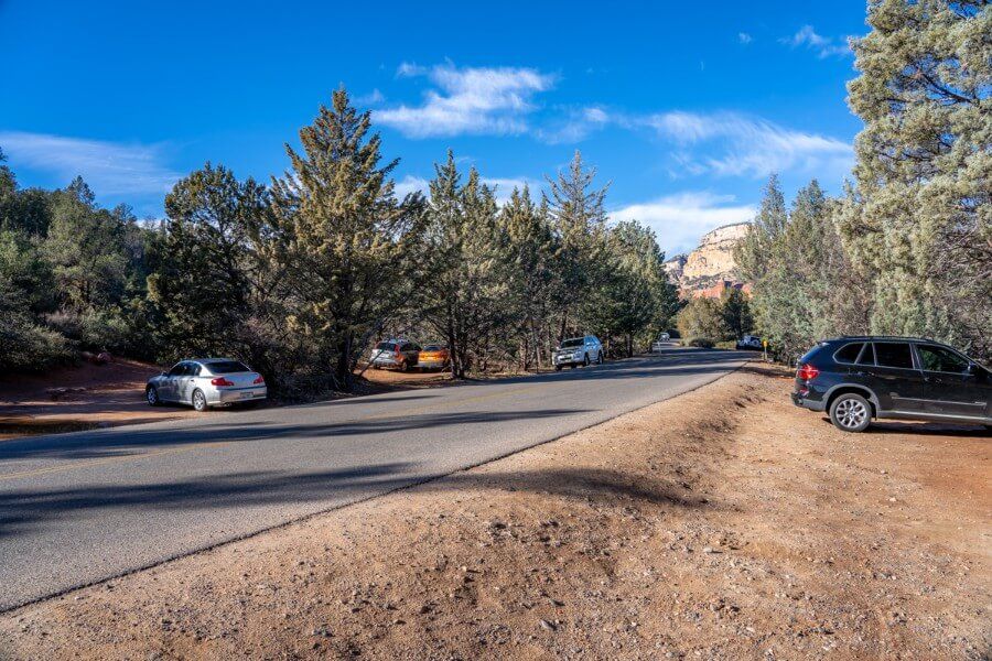 Long Canyon Trailhead parking area on the roadside and in a grouping of trees