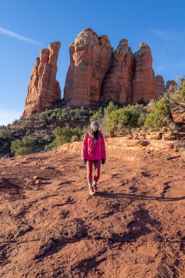 Hiking back down cathedral rock trail in sedona after summiting for sunrise blue sky and yellow glow