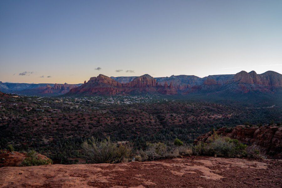 Looking out over sedona arizona from half way up cathedral rock trail before sunrise
