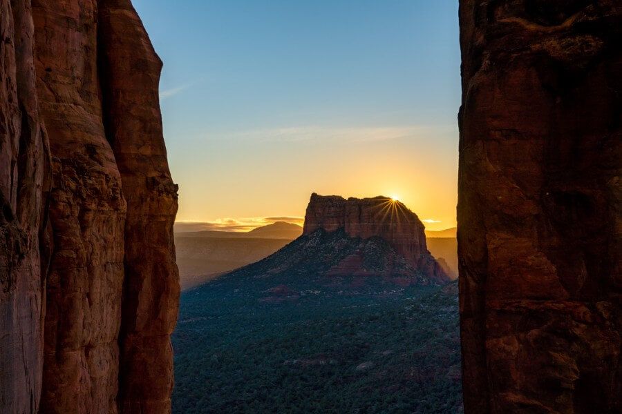 Sunrise behind Courthouse Butte from the summit Cathedral Rock trail hike in sedona arizona