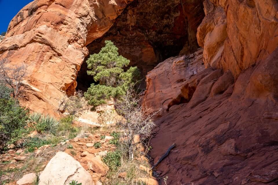 Steep ascent to reach Keyhole Cave entrance on loose stones