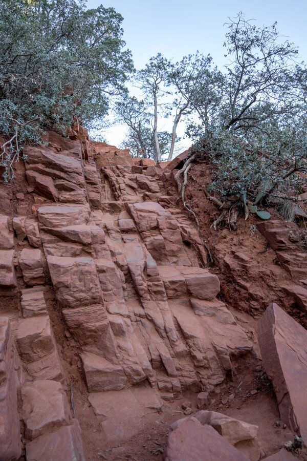 Tricky section of steep sharp rocks to navigate on the Devils Bridge Trail hike in Sedona Arizona