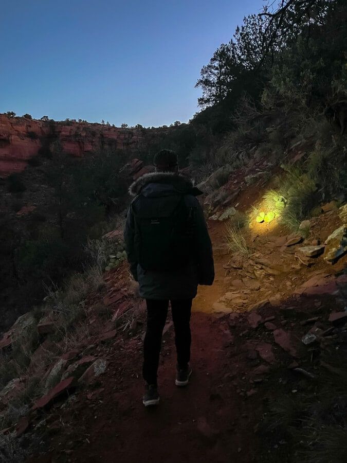 Hiking Doe Mountain in Sedona at sunrise with headlamp to light the trail