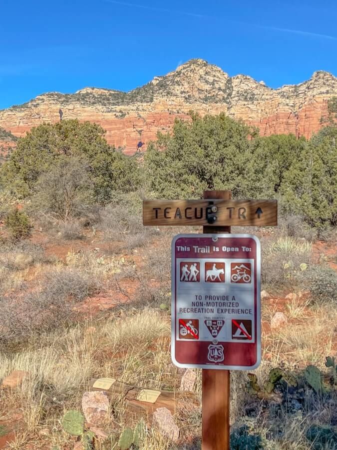 Teacup Trail in Sedona trailhead marker with Keyhole Cave visible in the background