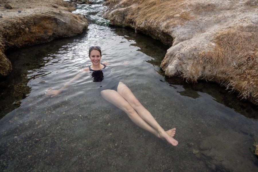 A women soaking at a hot spring completely submerged