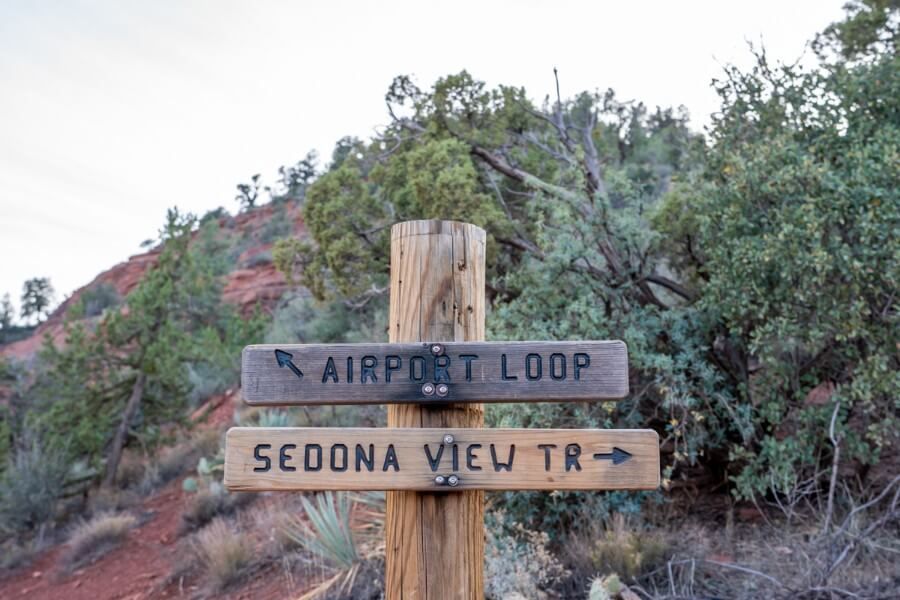 Airport Loop and Sedona View trail markers for directions on path