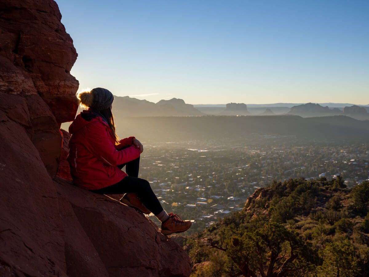 Where Are Those Morgans hiking to Chimney Rock summit for a stunning sunrise over Sedona in Arizona dawn light filling a wide open landscape on the Little Sugarloaf loop trail