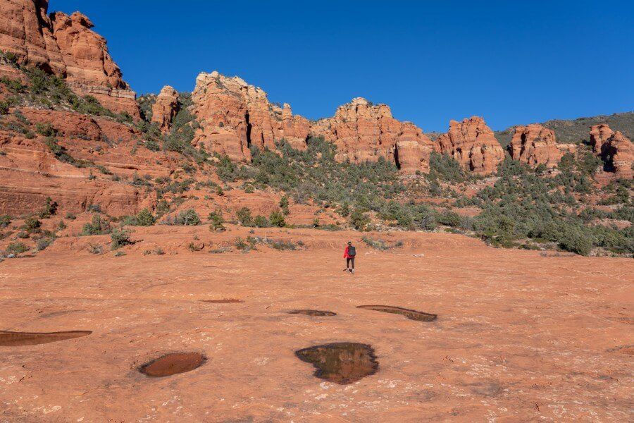 Hiker walking on Cow Pies on the Munds Wagon Trail in Arizona