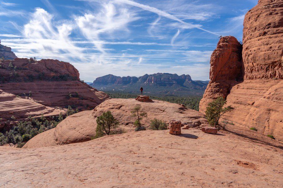 Hiker looking at amazing view from top of Little Horse Trail