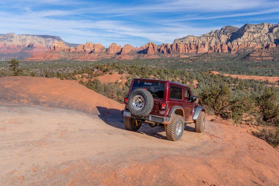 Rubicon on a dirt road with stunning views over red rock landscape