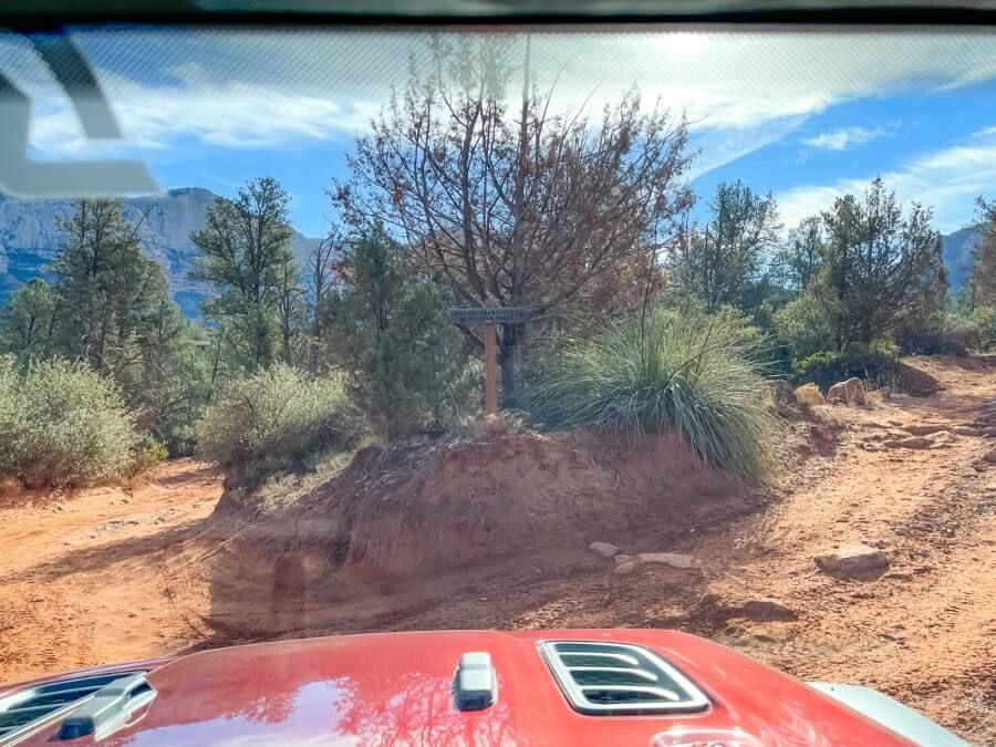 Split in dirt road leading to devils dining room sinkhole