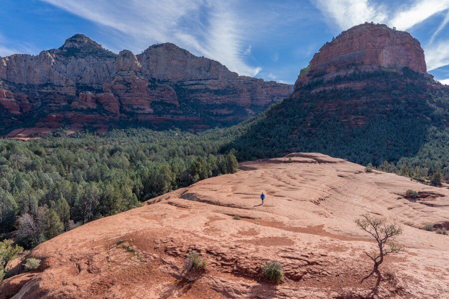 Man walking across Submarine Rock in Sedona