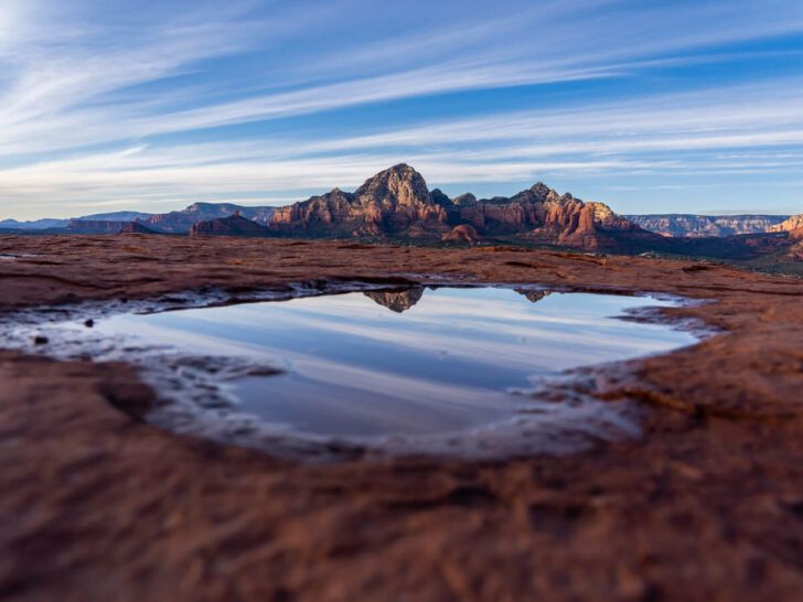 A popular vortex site in Sedona with a puddle of water