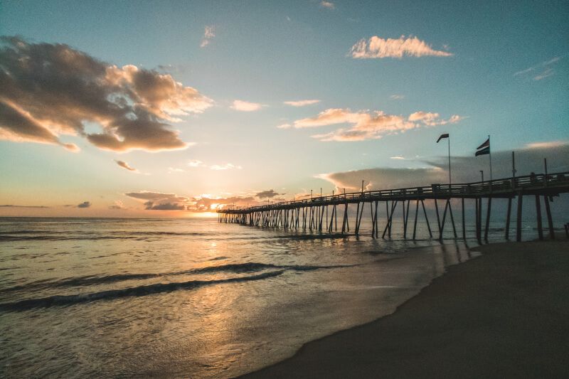 Sunrise at a pier in the Outer Banks of North Carolina