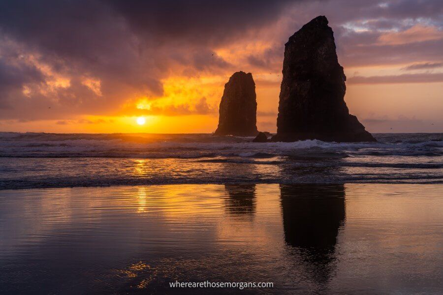 Stunning sunset at Cannon Beach on the Oregon Coast one of the best road trips in the US