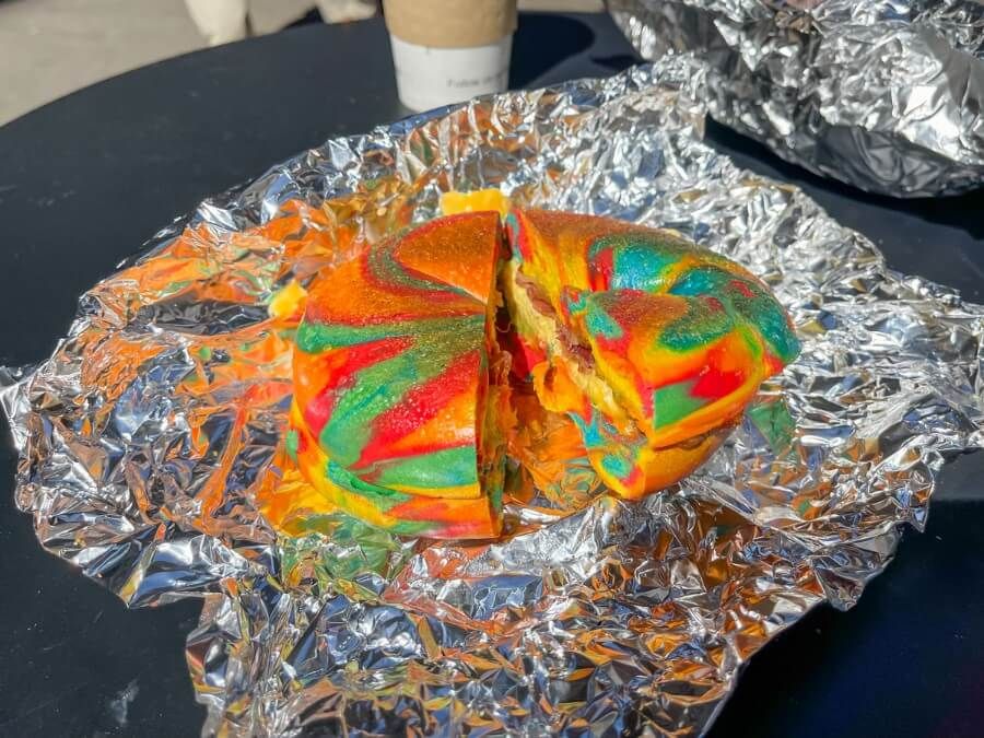A famous bright rainbow bagel in NYC