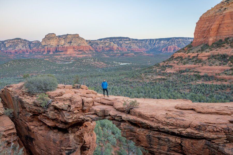 Man standing on Devils Bridge in Sedona Arizona