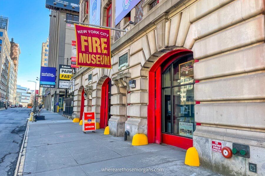 Exterior view of the NYC Fire Museum with red flag