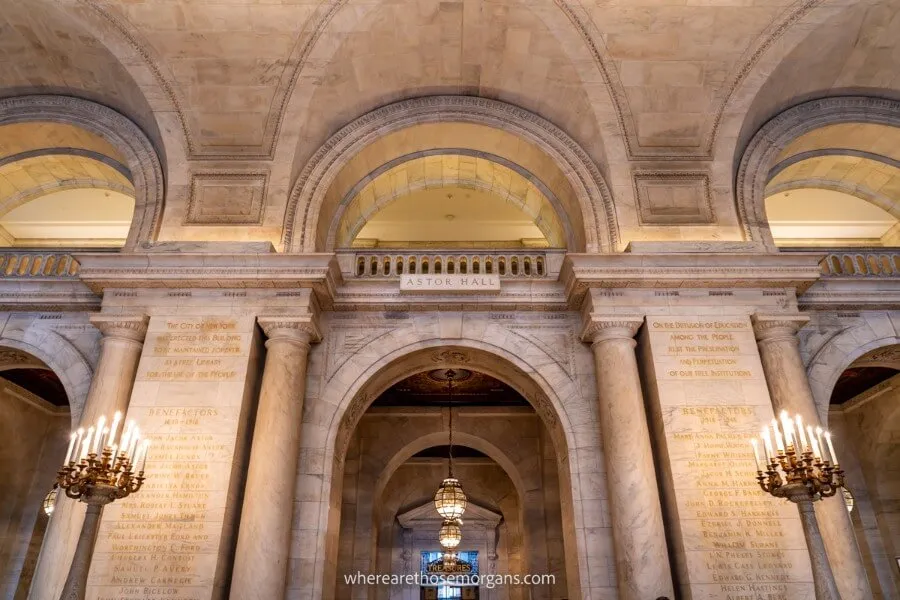 A large stone hallway inside the New York Public Library