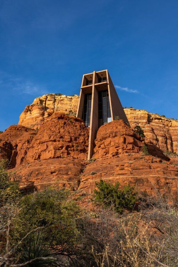 Chapel of the Holy Cross from below with a clear blue skyin Sedona Arizona