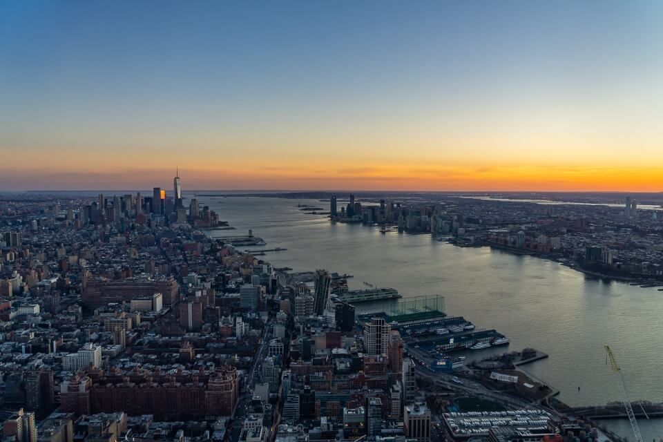 The Manhattan skyline and Hudson River view at sunset