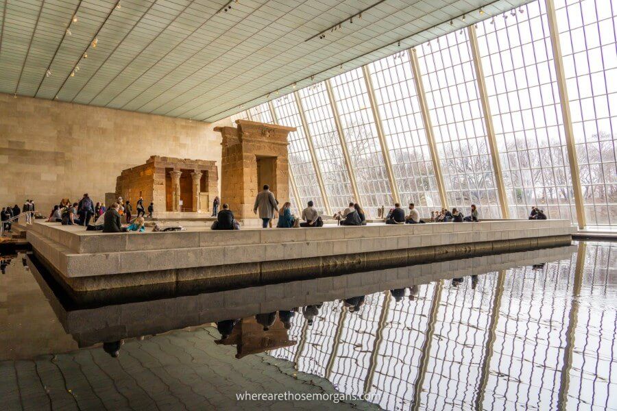 Visitors in front of the Temple of Dendur at the Met in New York City