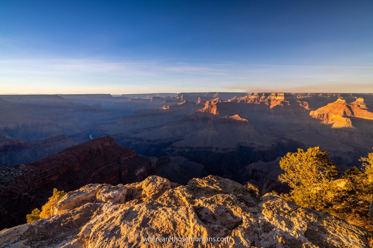 Sunset colors at Grand Canyon South Rim in Arizona blue sky yellow rocks