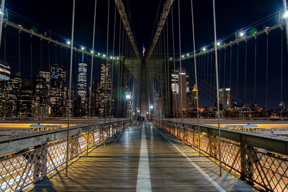 Lights on at Brooklyn Bridge at night