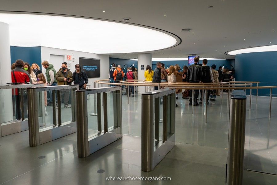 Long lines waiting for security and entry at a NYC observation deck