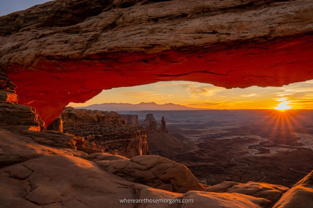 Mesa Arch at sunrise is one of the best photography spots and places to visit on a photography trip to Utah