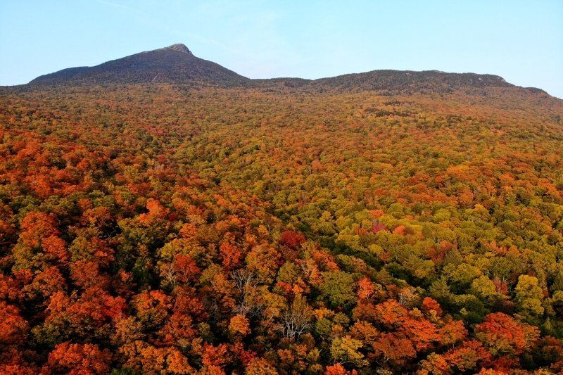 Camel's Hump State Park rock formation surrounded by colorful trees