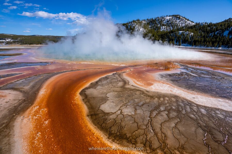 Colorful swirling patterns at Grand Prismatic Spring one of the best places to visit in Wyoming and photography here is among the most fun things to do in Yellowstone
